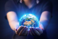 Hands holding planet earth