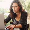At computer